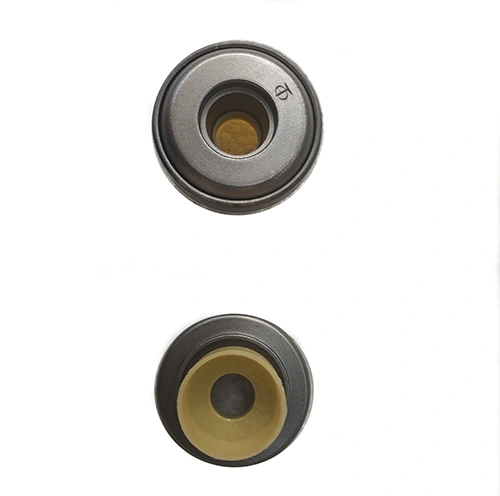Rotating spring seat and oil cover components 